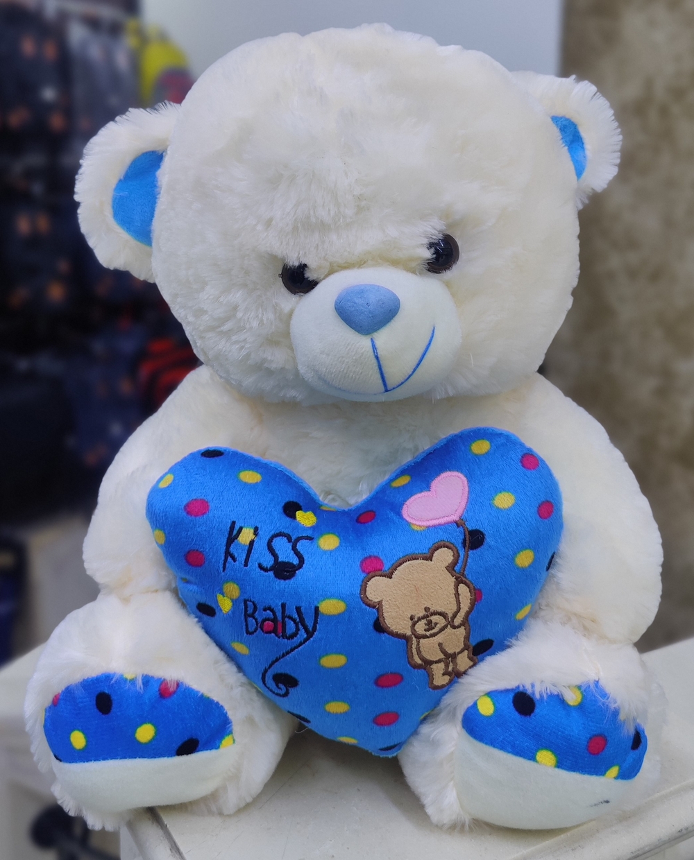 White Teddy Bear Holding a Blue Heart Pillow ( 40cms)